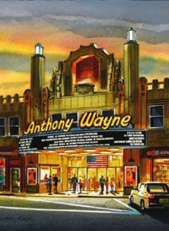 The historic Anthony Wayne theater illuminated at dusk, with a marquee and patrons enjoying a film outside.
